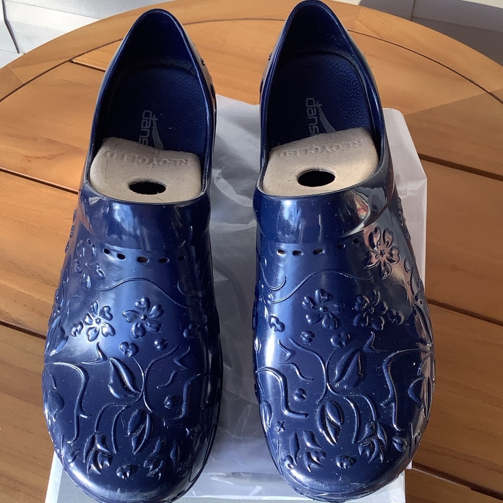 Dansko Navy Embossed Floral Clogs